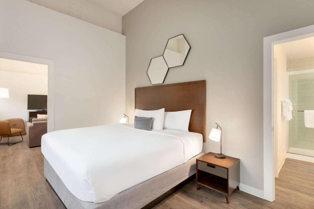 A king guest room at the Leavenworth Local, with the tall ceiling the classroom bay allowed